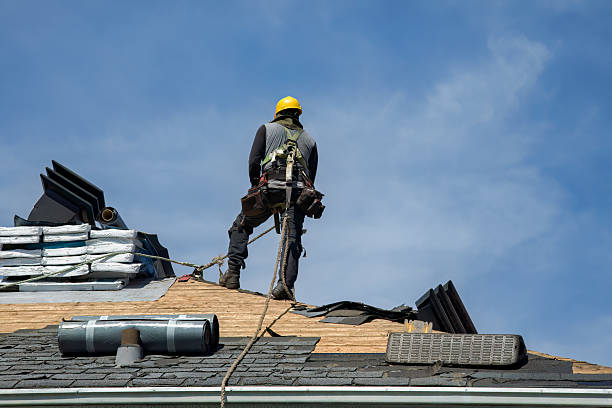 Professional Gutter Installation technician working in Falls Village, CT